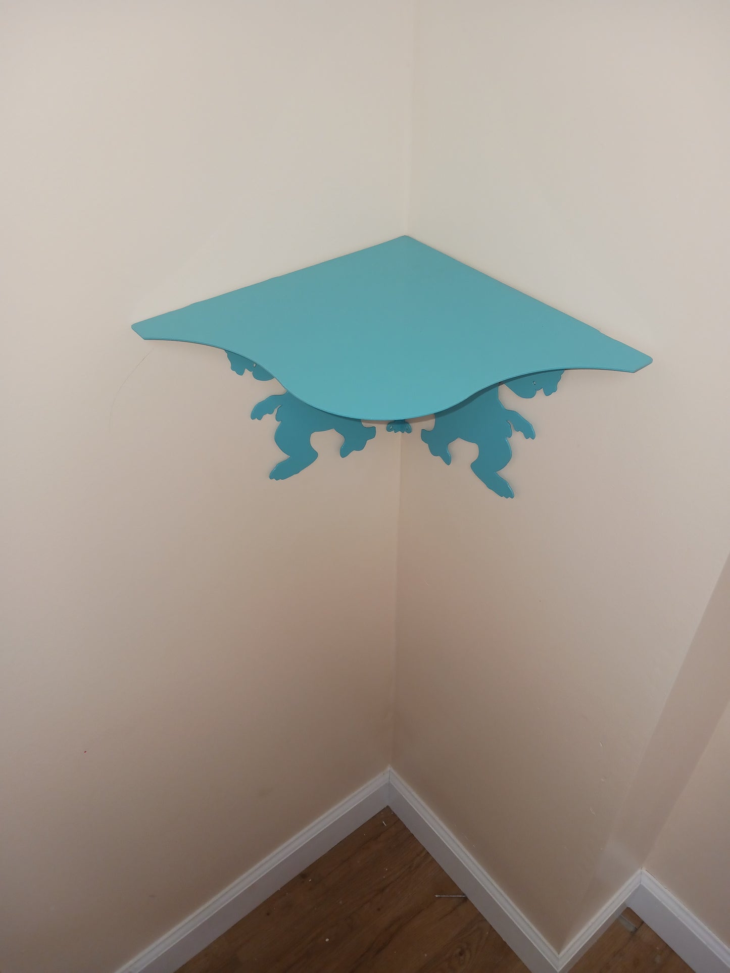 Blue T-rex corner shelf